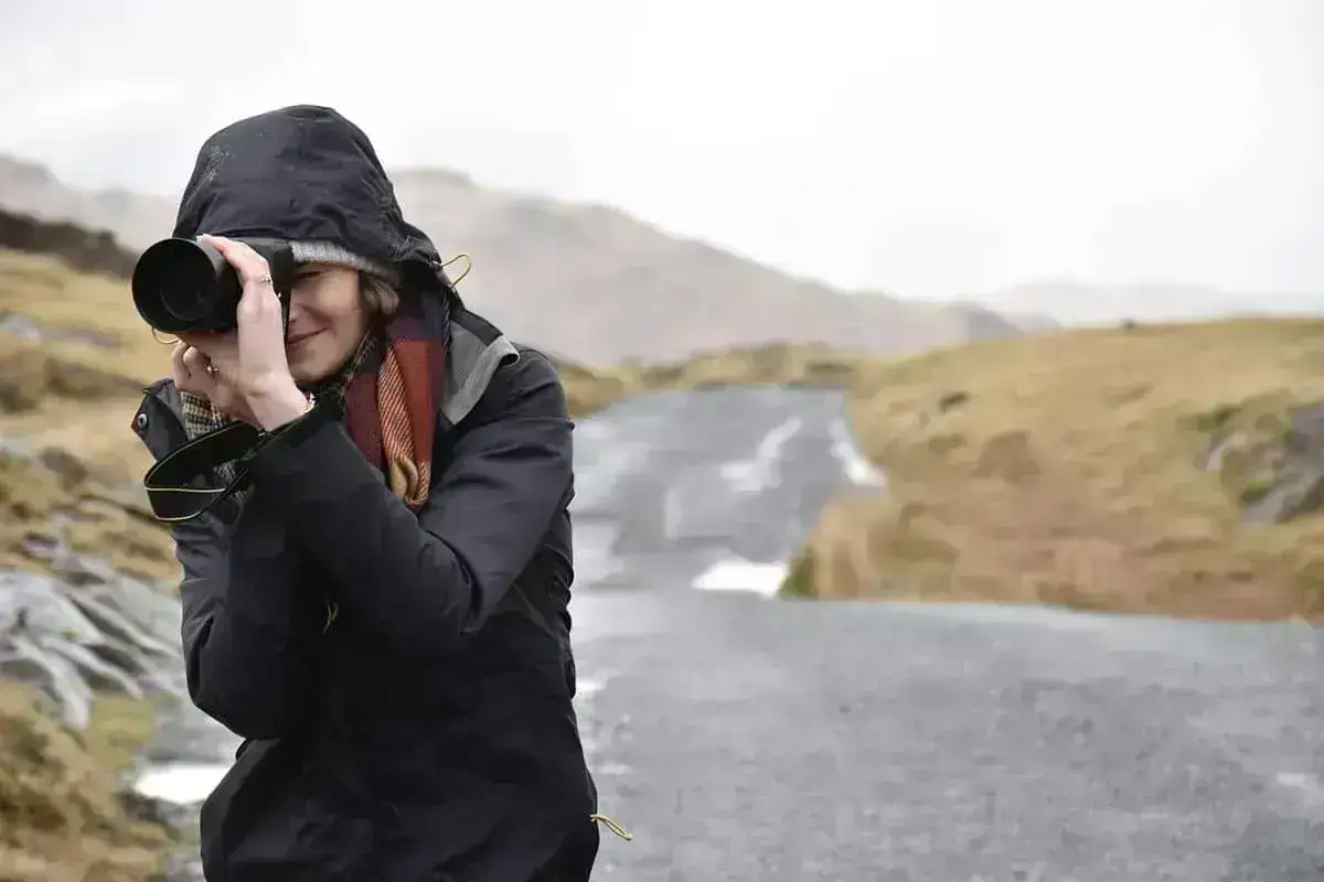 Photographer taking professional photos of a holiday let property interior
