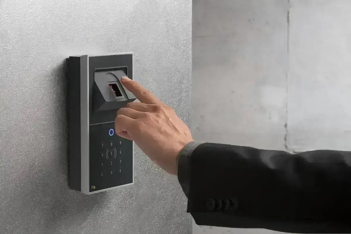 Biometric fingerprint reader used for identity verification and risk-based screening